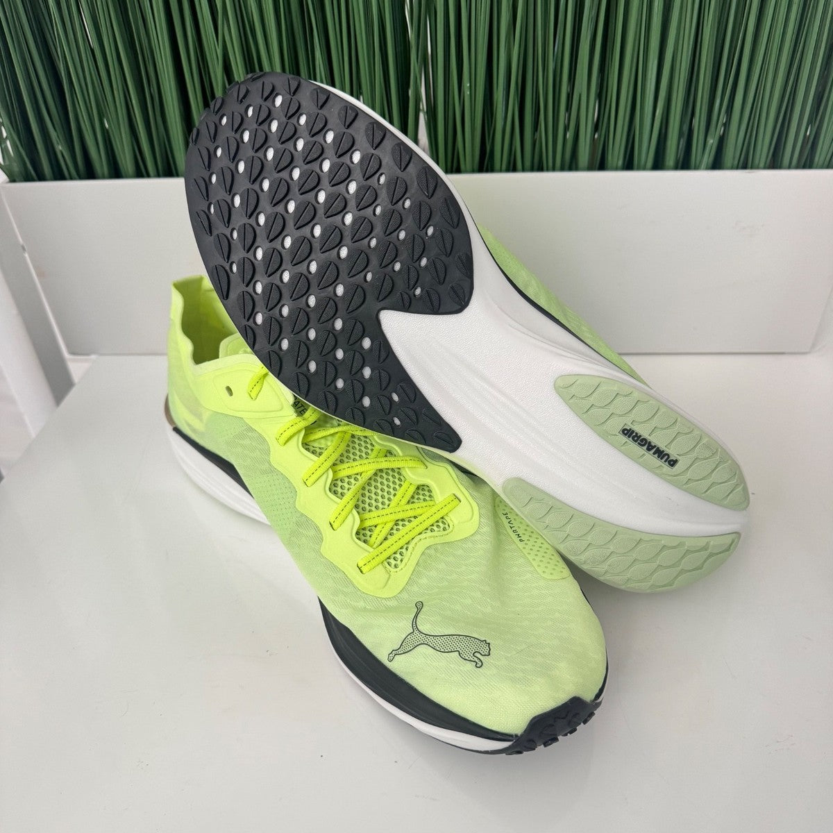 Puma Liberate Nitro 2 Run 75 Running Shoes in a neon yellow colorway with metallic bronze heel branding