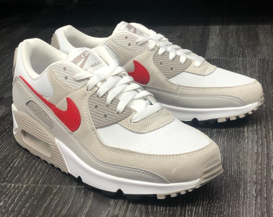 The Nike Air Max 90 Essential 'Beige Chalk/University Red', featuring
