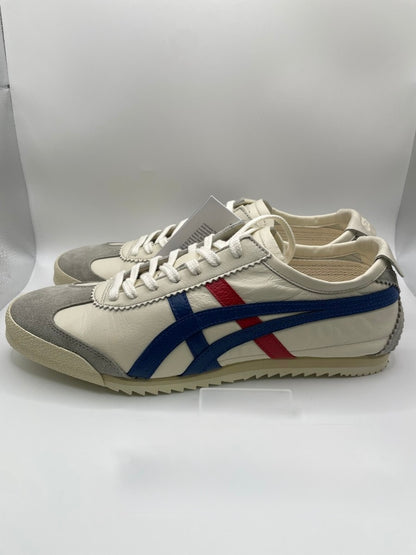 Onitsuka Tiger Mexico 66 Deluxe Nippon Made sneakers in white, blue, and red.