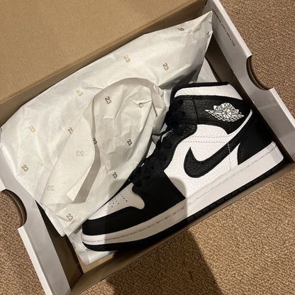 Air Jordan 1 Low SE 'Homage' (DR0502-101), featuring a striking black-and-white split design on tumbled leather