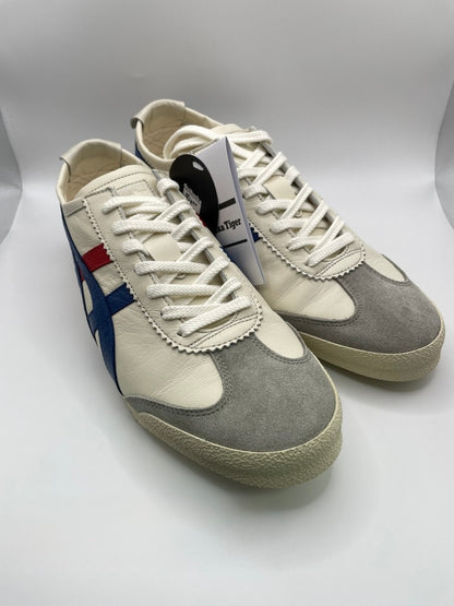 Onitsuka Tiger Mexico 66 Deluxe Nippon Made sneakers in white, blue, and red.