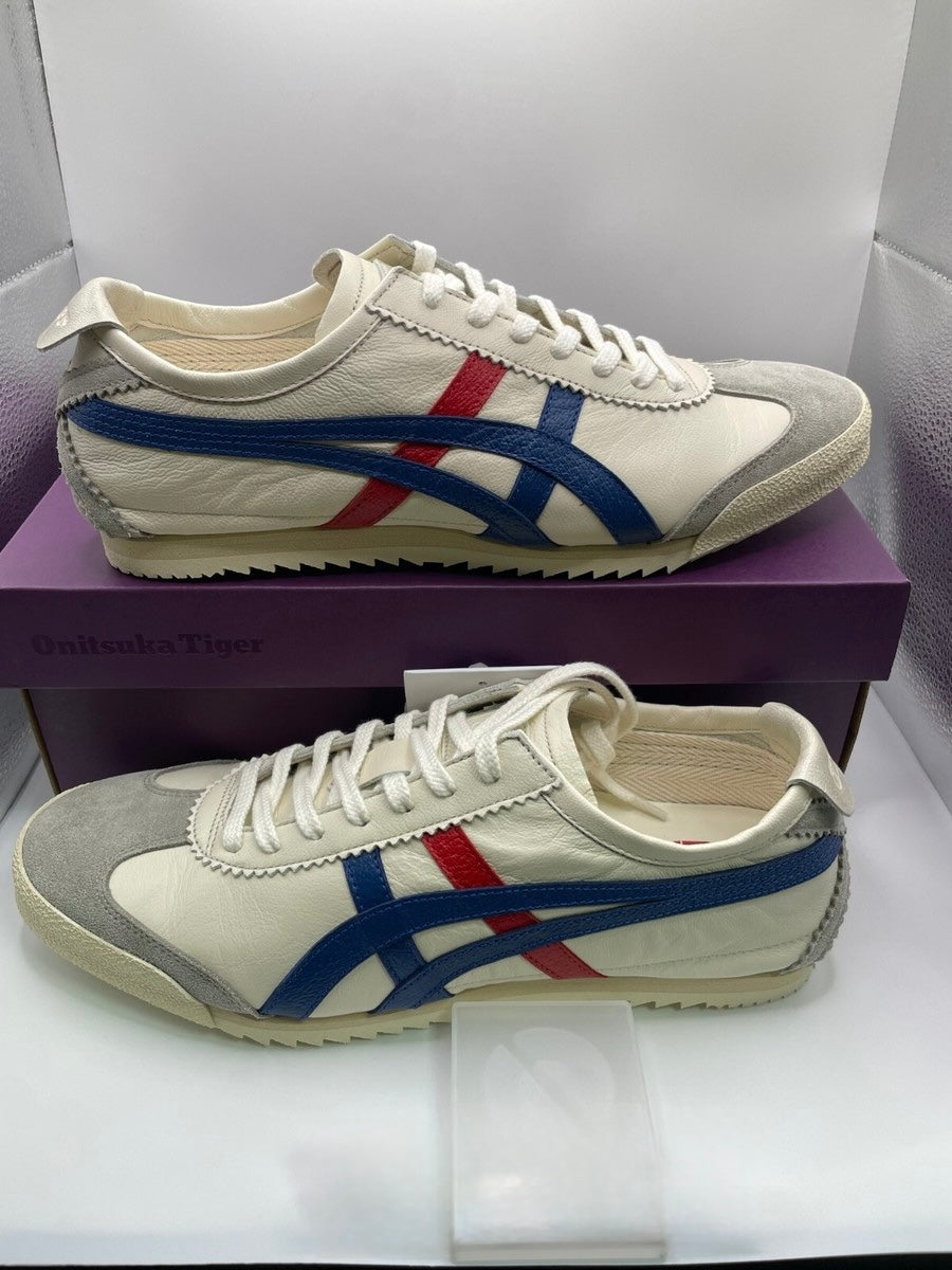 Onitsuka Tiger Mexico 66 Deluxe Nippon Made sneakers in white, blue, and red.