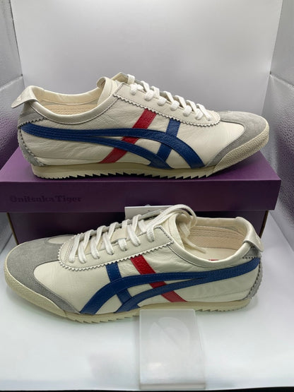 Onitsuka Tiger Mexico 66 Deluxe Nippon Made sneakers in white, blue, and red.