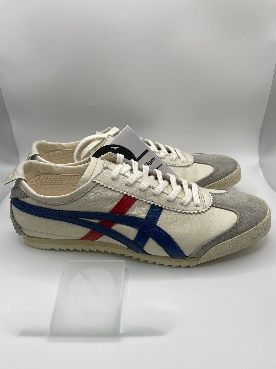 Onitsuka Tiger Mexico 66 Deluxe Nippon Made sneakers in white, blue, and red.