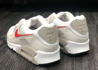 The Nike Air Max 90 Essential 'Beige Chalk/University Red', featuring