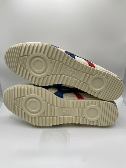 Onitsuka Tiger Mexico 66 Deluxe Nippon Made sneakers in white, blue, and red.