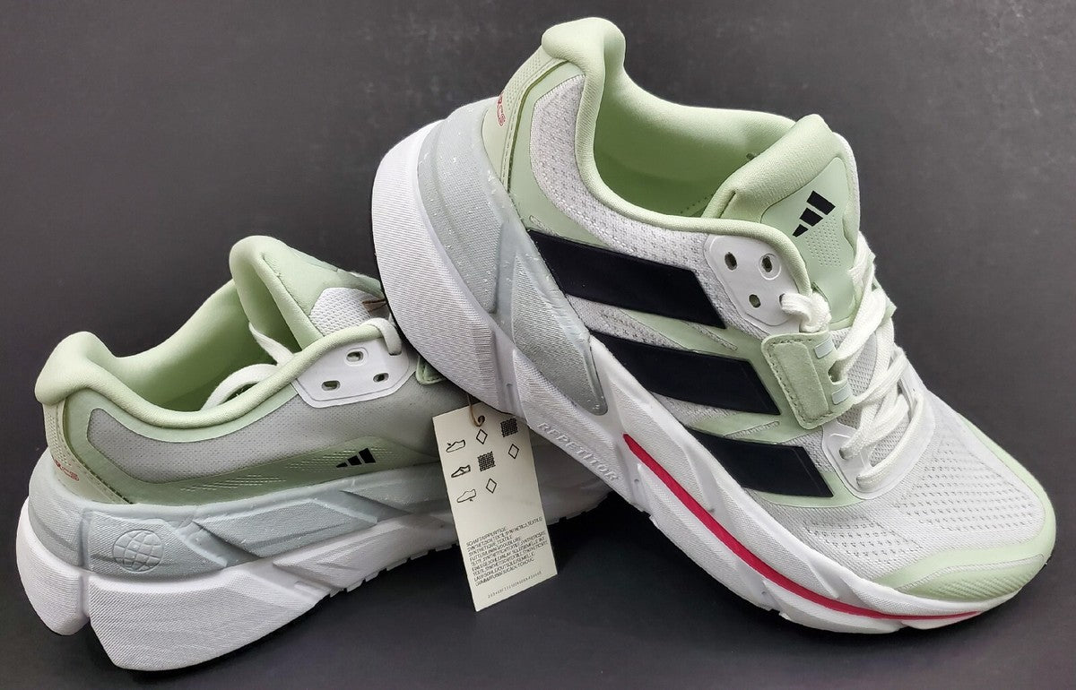 Adidas Adistar CS 'White Team Real Magenta' featuring a cloud white mesh upper with pale green and black