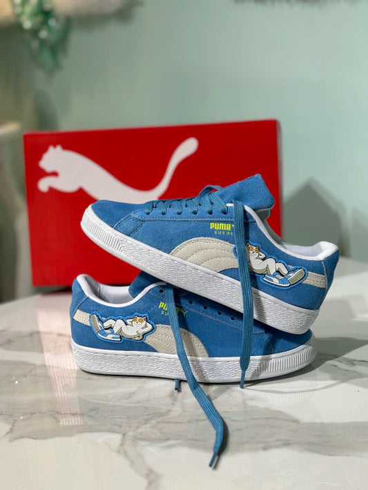 The PUMA x RIPNDIP Suede sneaker in Regal Blue features a distinctive silicone